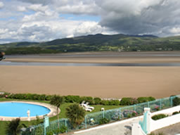 The hotel pool and estuary beach.