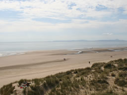 Surely a beach this long flat and long was used for land speed record attempts in the past?