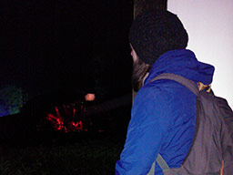 Fiona watching a band while looking every bit the rambler – anorak, gloves and woolly hat!