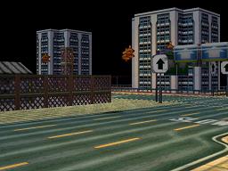 Looking across an intersection at a bank from street level.