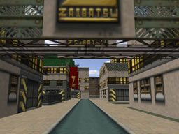 Click to view large image Looking directly down a narrow road, warehouses either side, with a Zaibatsu gantry framing the top of the picture.