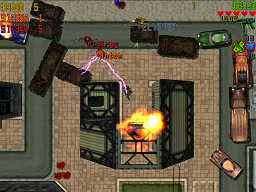 Click to view large image Anton is electrocuting me whilst I shoot him. Radirgy is between shots and Elypter is running towards him, also shooting! The players are surrounded by wrecked vehicles.
