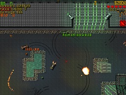Click to view large image 4-player game in dusk shows energy pools, respawn zone with white bikes, edge of the spiral and bullets going everywhere! A mine explodes but everyone has avoided it.