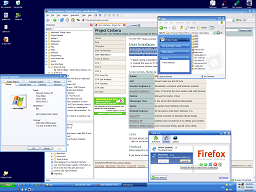 My desktop showing: System Properties, confirming I have Windows XP Home Edition; Firefox 2 with the Bookmarks sidebar open and 2 tabs displayed; the Add-ons window showing Winestripe is my current Firefox skin; and finally a Windows Explorer window showing the contents of my Project Cerbera blog folder.