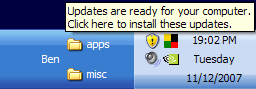 Ballon tip coming from system tray says: &ldquo;Updates are ready for your computer. Click here to install these updates.&rdquo;